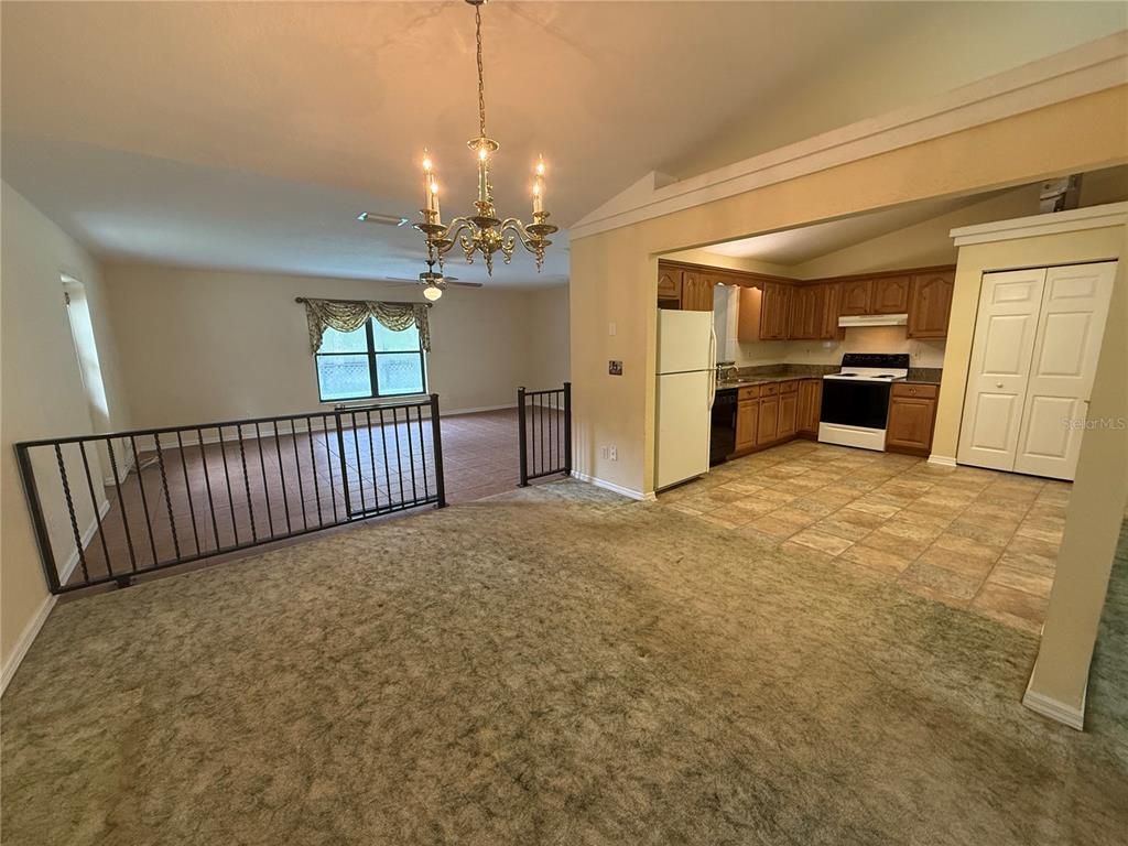 19260 Northwest 88th Avenue Road Reddick, FL 32686 - Photo 6 of 41 a view of a kitchen with a sink and stainless steel appliances