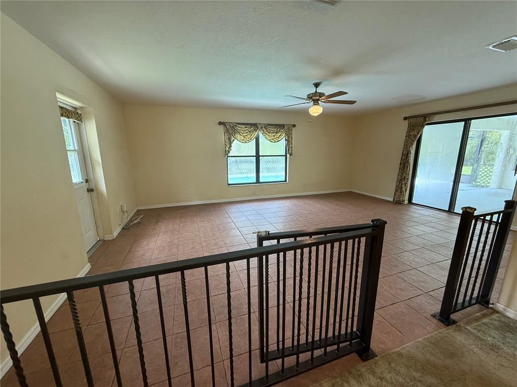 19260 Northwest 88th Avenue Road Reddick, FL 32686 - Photo 9 of 41 a view of a hallway with windows