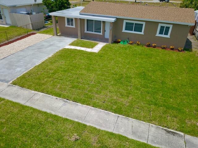 1320 West 3rd Street Riviera Beach, FL 33404 - Photo 1 of 13 Front