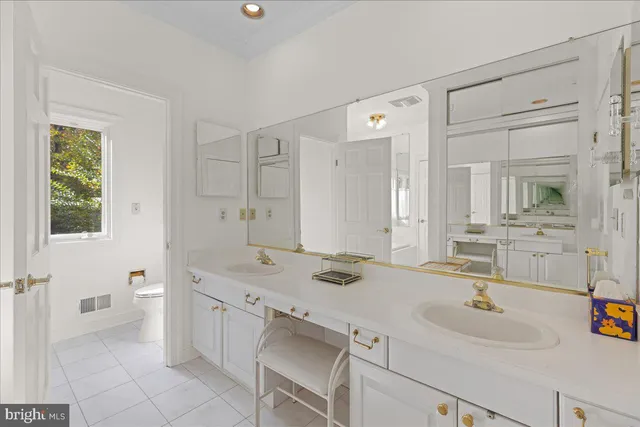 a view of staircase with lots of wooden floor and a potted plant