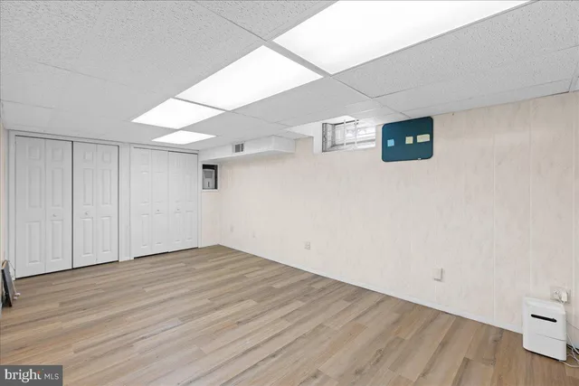 a view of a balcony with trees