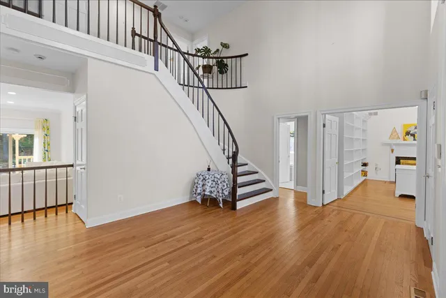 a view of entryway with wooden floor