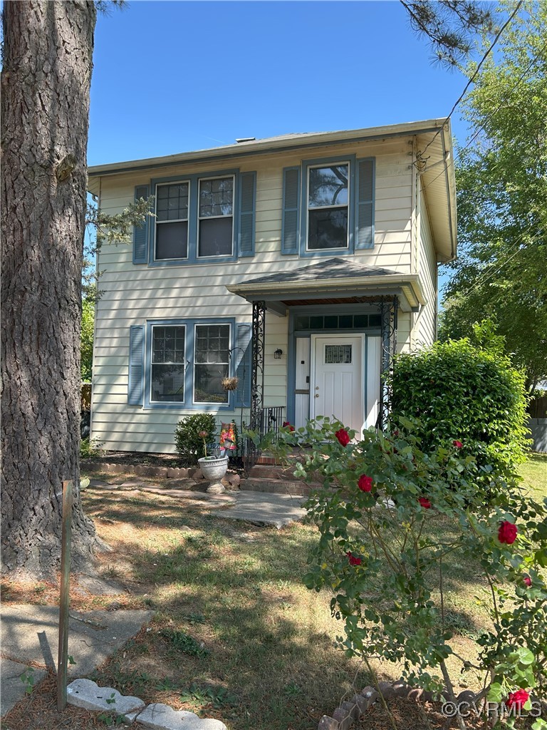 a front view of a house with patio