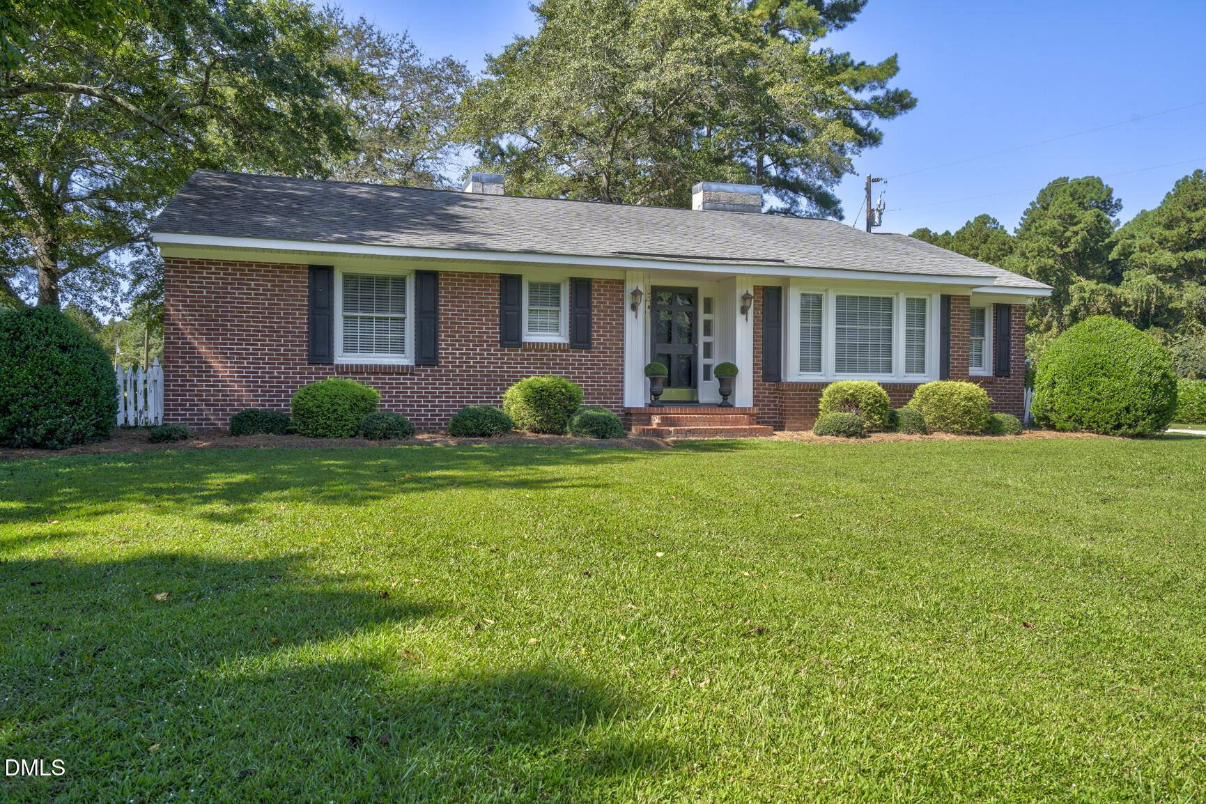 6515 Tonya Road Elm City, NC 27822 - Photo 2 of 52 a front view of a house with garden