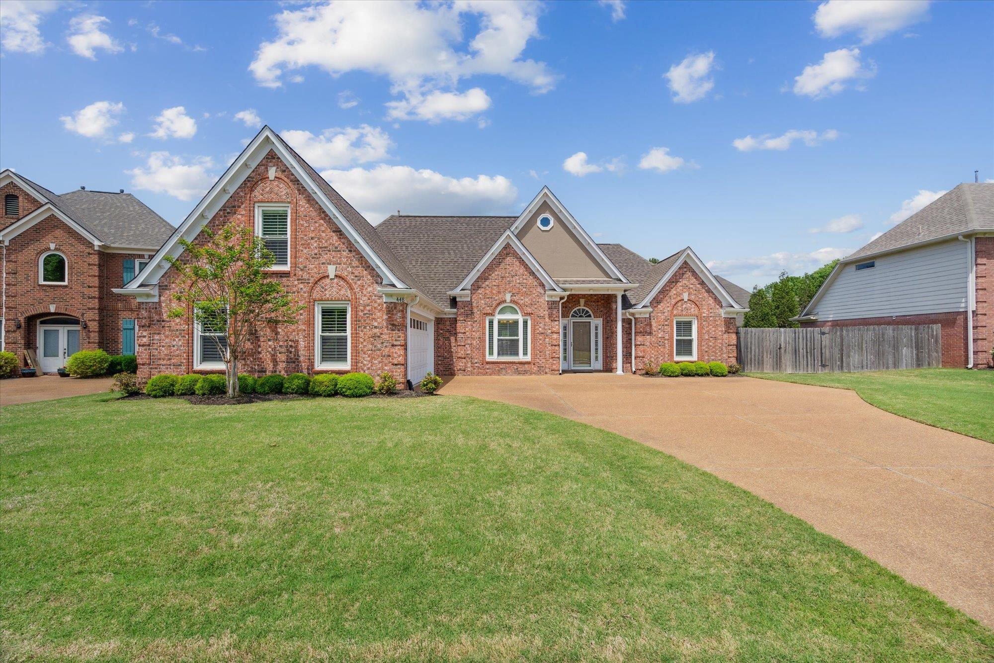 448 Queens Bridge Road Collierville, TN 38017 - Photo 1 of 32 a view of a yard in front of house