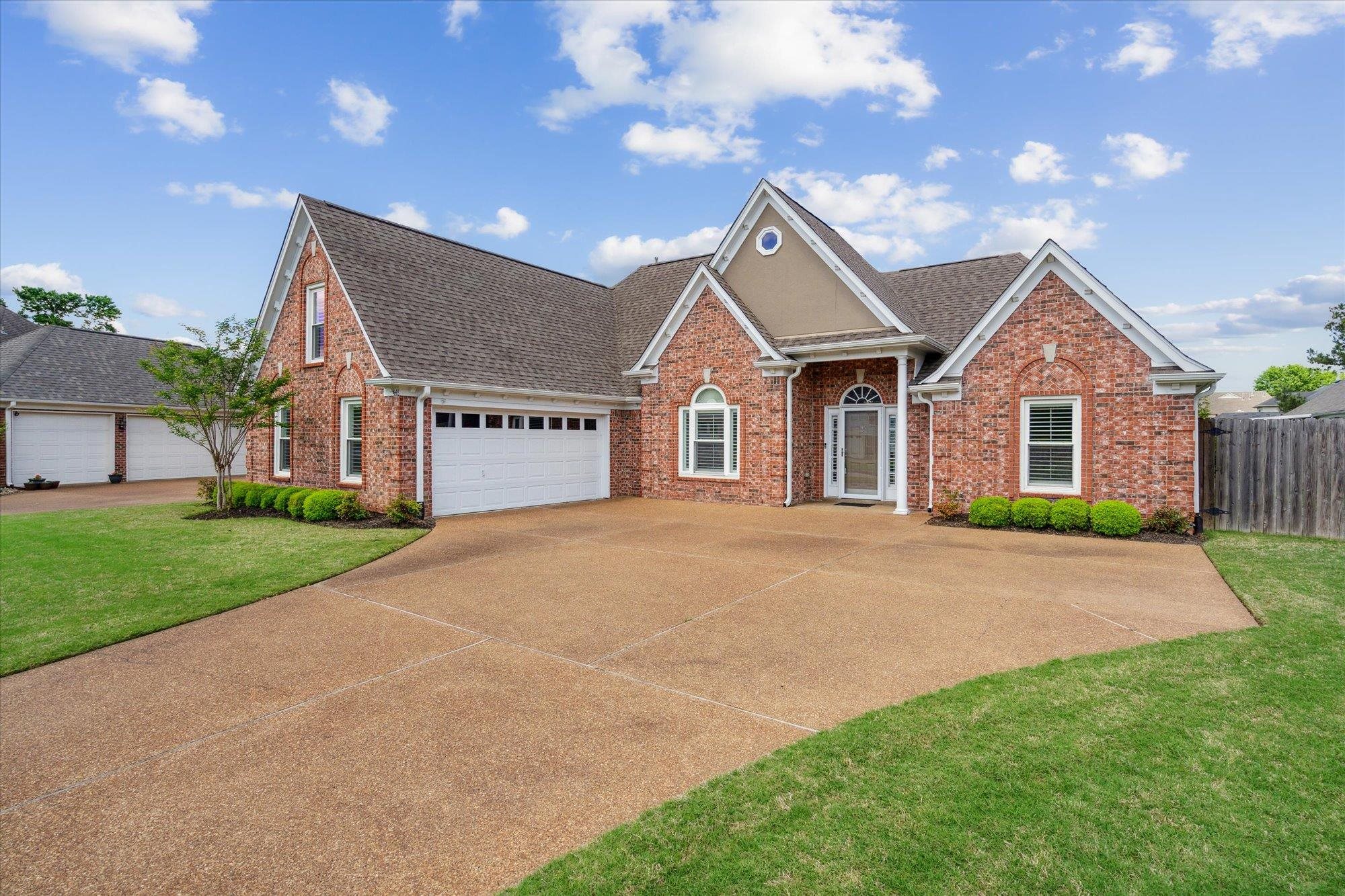 448 Queens Bridge Road Collierville, TN 38017 - Photo 2 of 32 a view of outdoor space yard and front view of a house