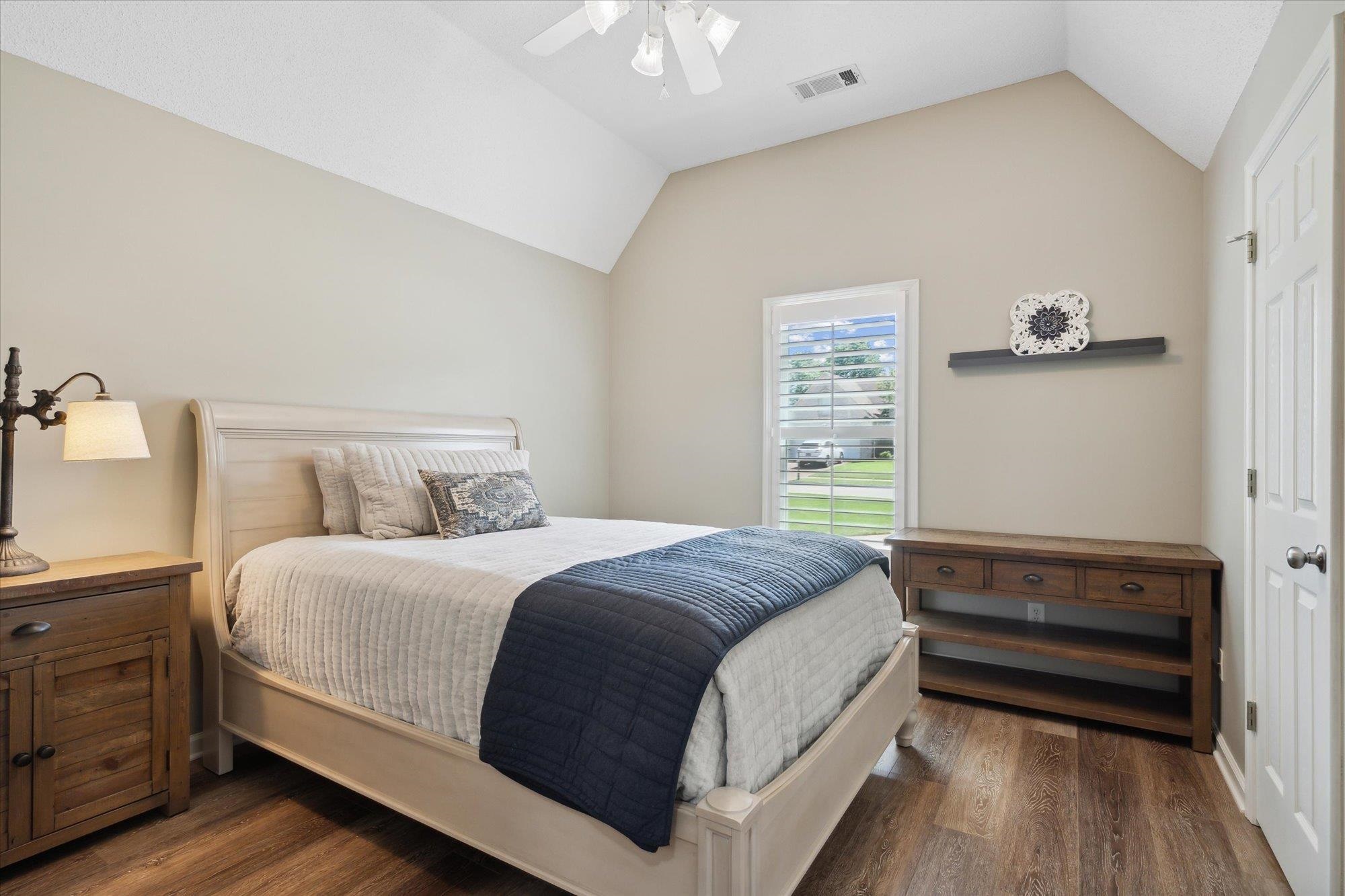 448 Queens Bridge Road Collierville, TN 38017 - Photo 25 of 32 a bedroom with a bed and a window