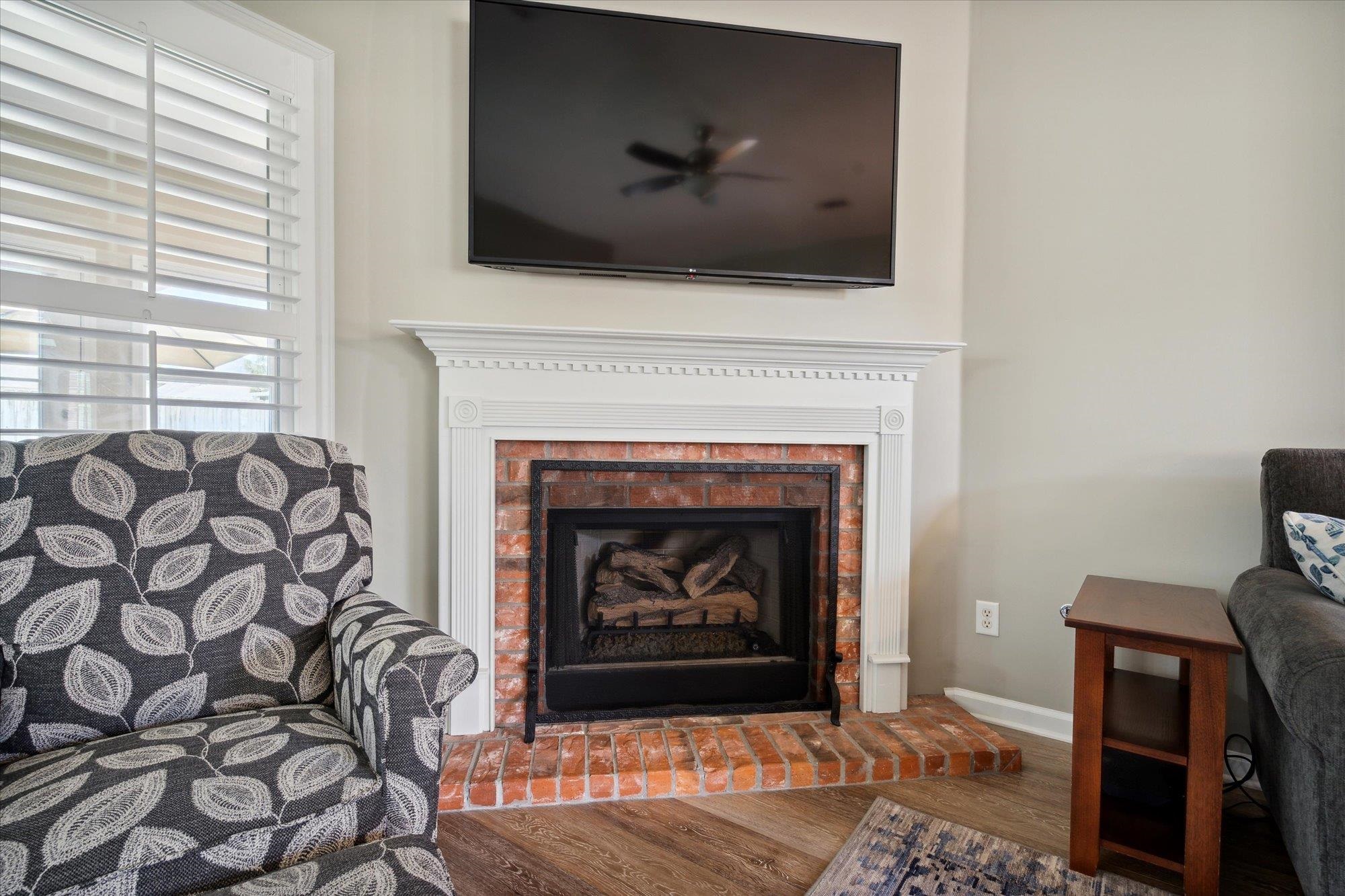 448 Queens Bridge Road Collierville, TN 38017 - Photo 8 of 32 a living room with a fireplace and a fireplace