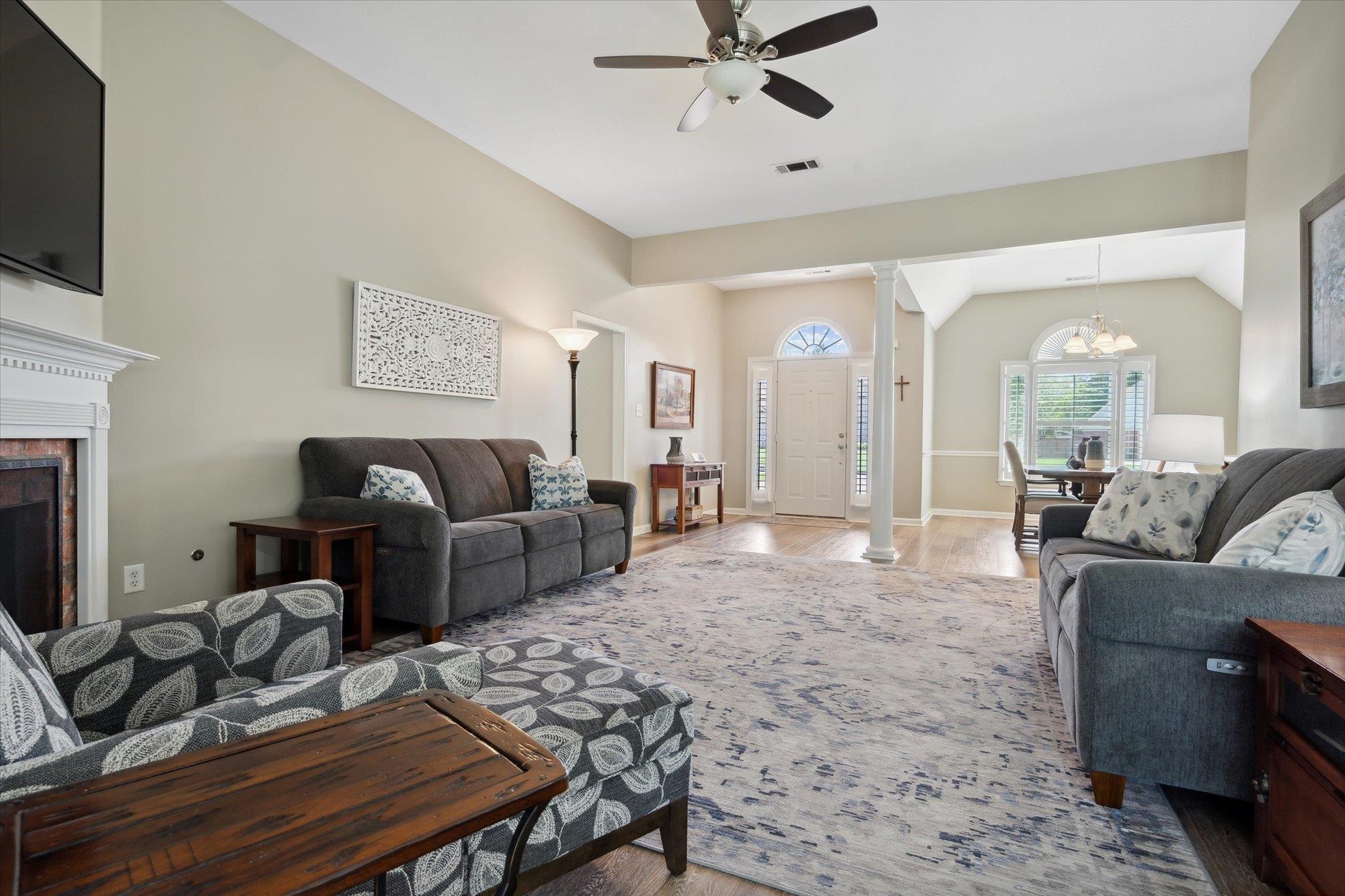 448 Queens Bridge Road Collierville, TN 38017 - Photo 9 of 32 a living room with furniture and a flat screen tv