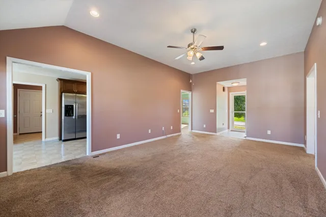 an empty room that has a window