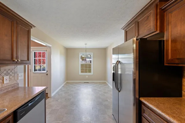 a bathroom with a shower and a bath tub