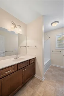 a view of a kitchen with washer and dryer