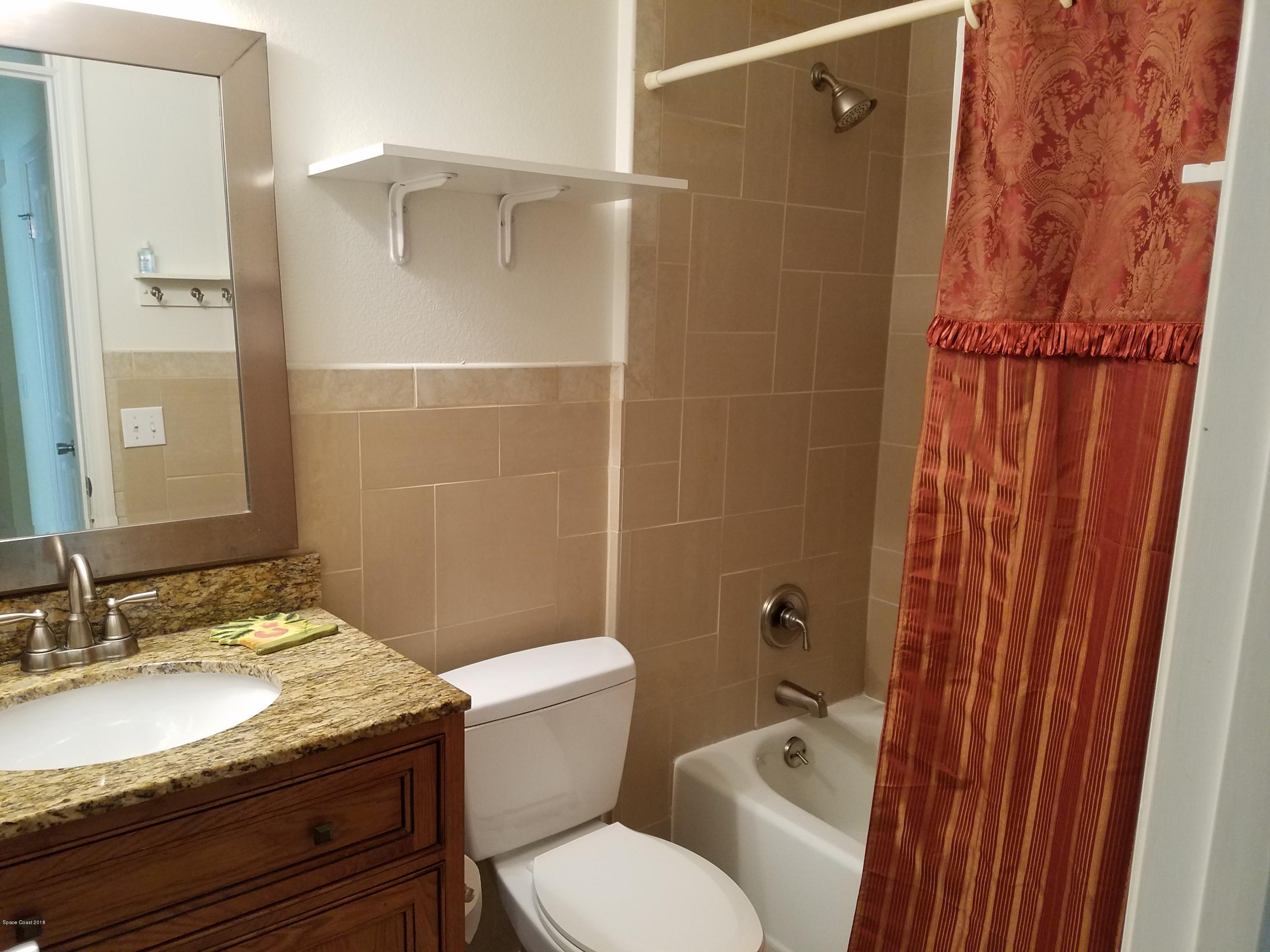 919 Commerce Road Southeast, Unit 12 Palm Bay, FL 32909 - Photo 14 of 29 Guest Tub/shower Bath