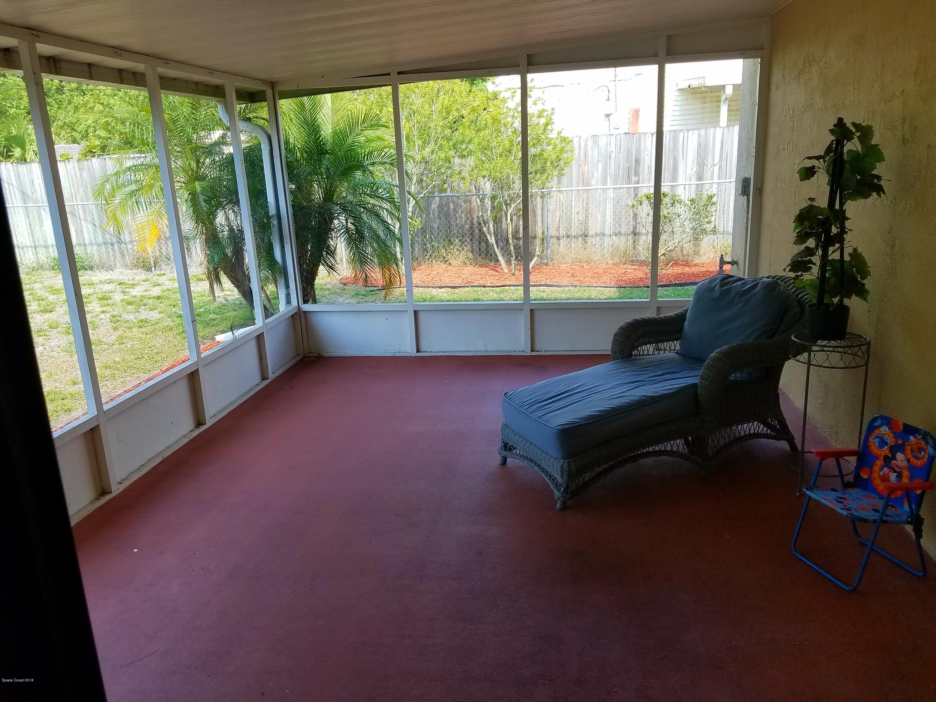 919 Commerce Road Southeast, Unit 12 Palm Bay, FL 32909 - Photo 20 of 29 Back Screen Porch