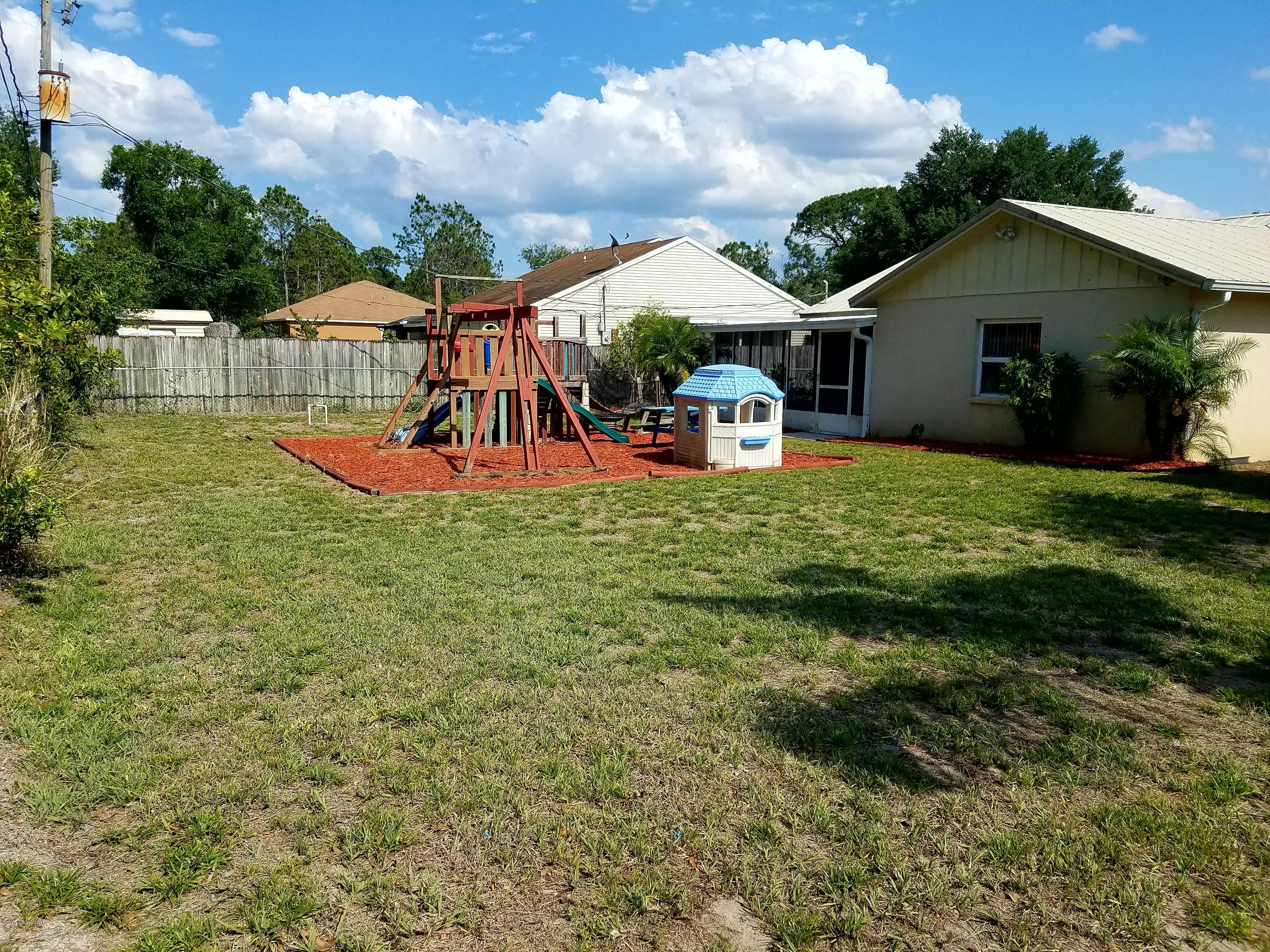 919 Commerce Road Southeast, Unit 12 Palm Bay, FL 32909 - Photo 26 of 29 Back Yard