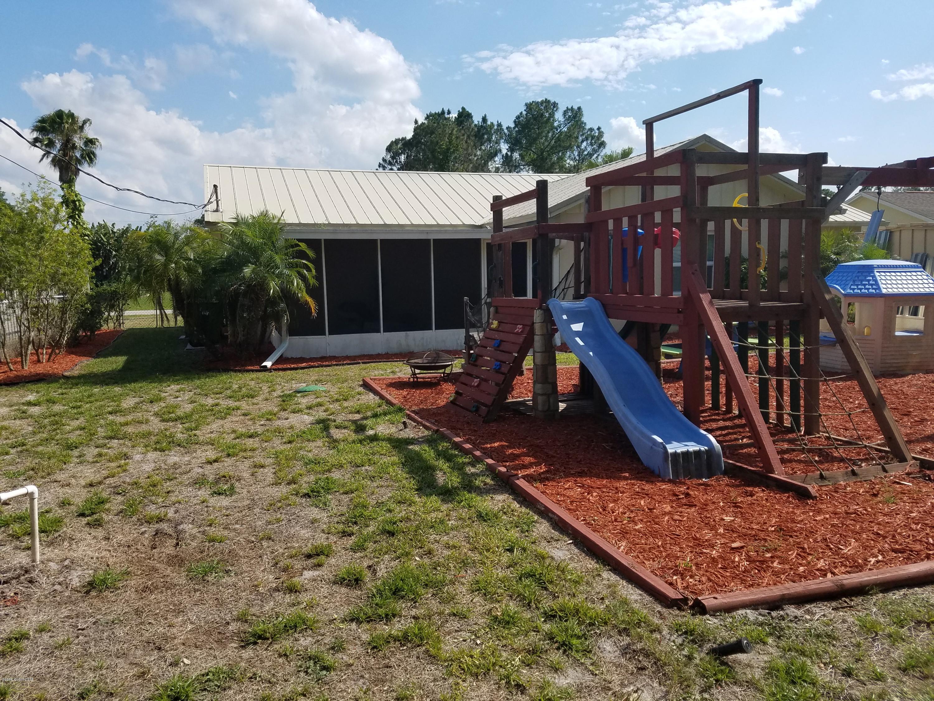 919 Commerce Road Southeast, Unit 12 Palm Bay, FL 32909 - Photo 27 of 29 Back yard Play