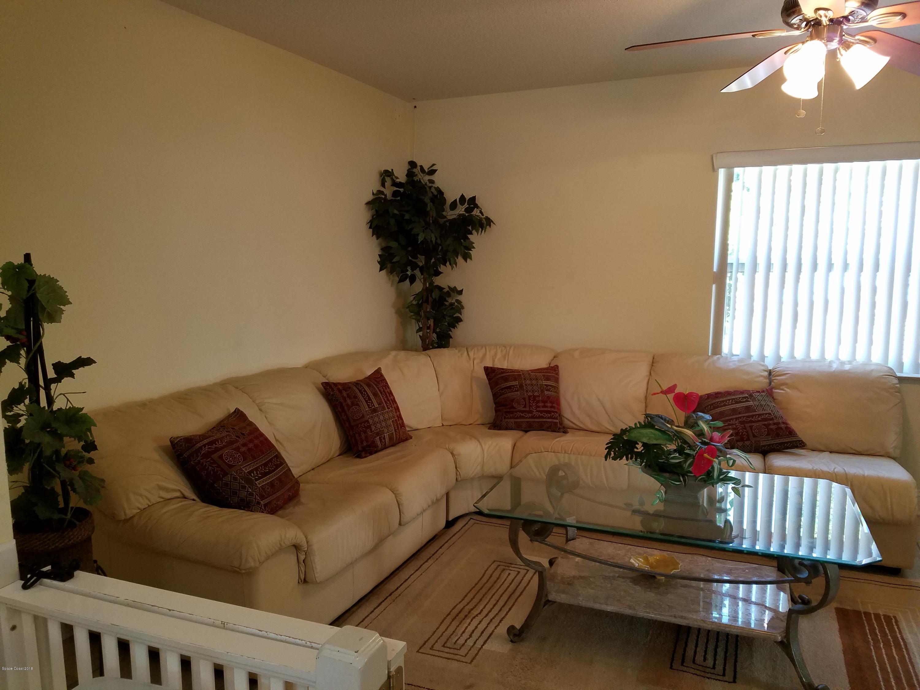 919 Commerce Road Southeast, Unit 12 Palm Bay, FL 32909 - Photo 5 of 29 Family Room