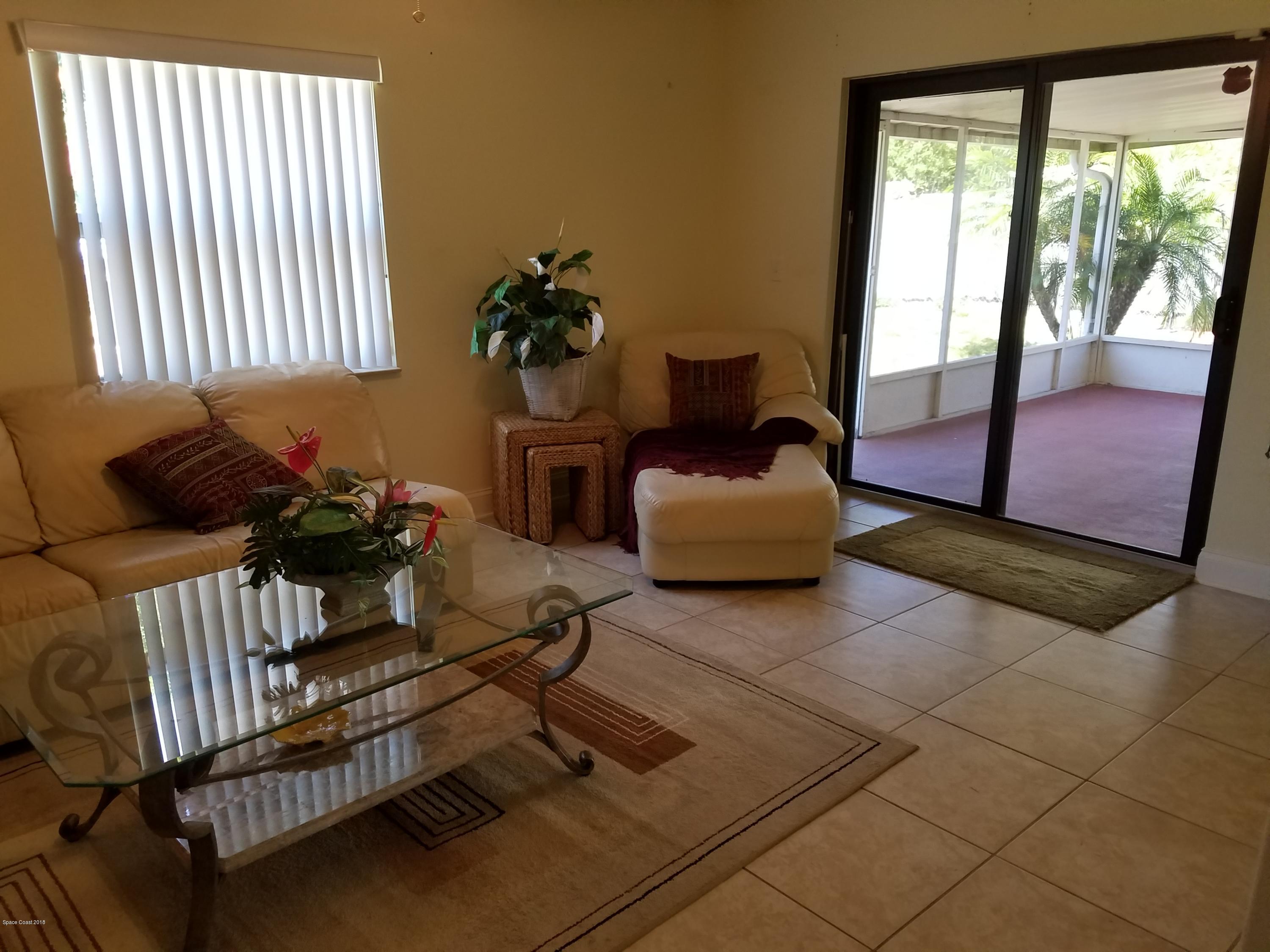 919 Commerce Road Southeast, Unit 12 Palm Bay, FL 32909 - Photo 6 of 29 Family Room