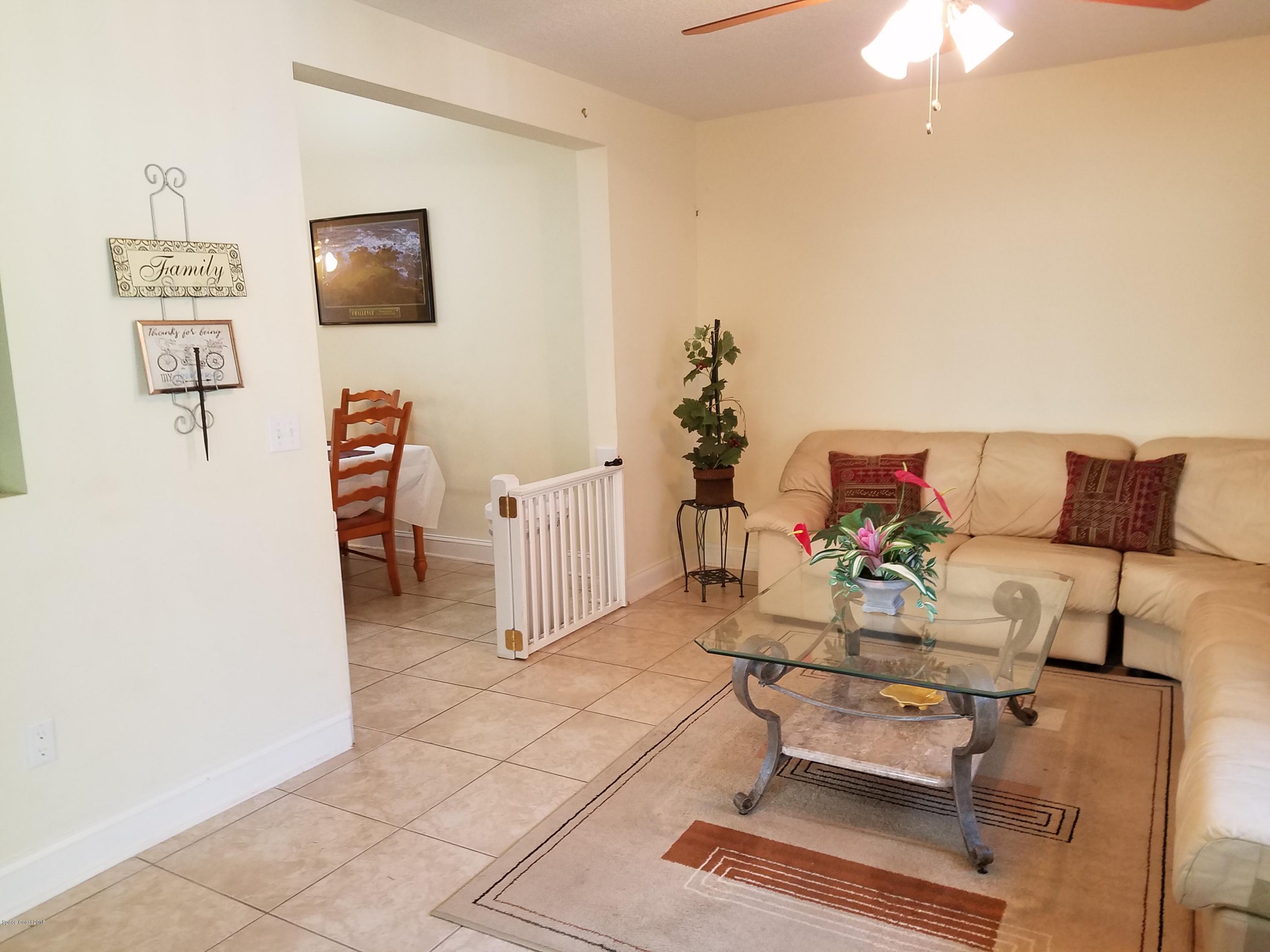 919 Commerce Road Southeast, Unit 12 Palm Bay, FL 32909 - Photo 7 of 29 Family Room