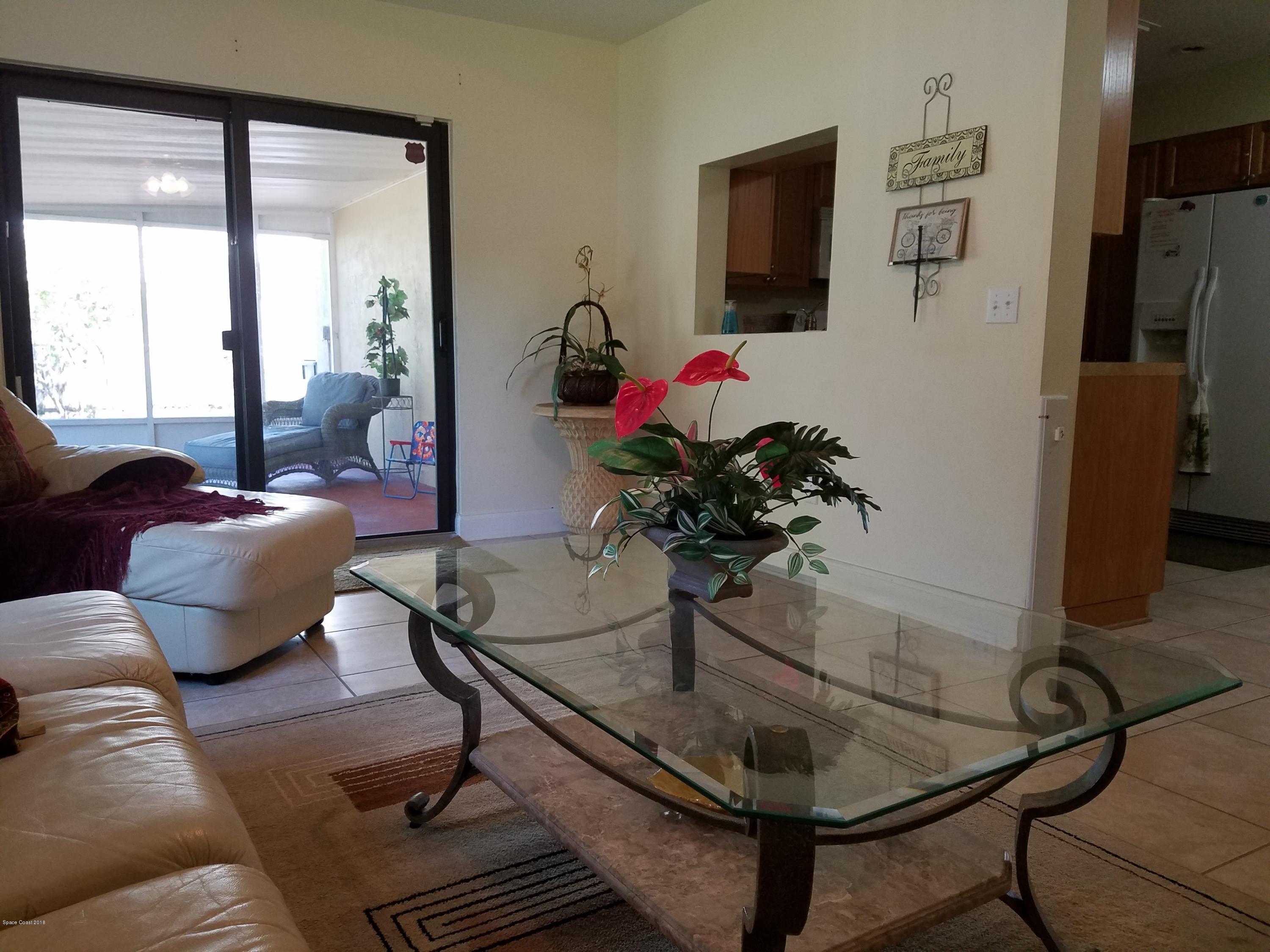 919 Commerce Road Southeast, Unit 12 Palm Bay, FL 32909 - Photo 8 of 29 Family Room