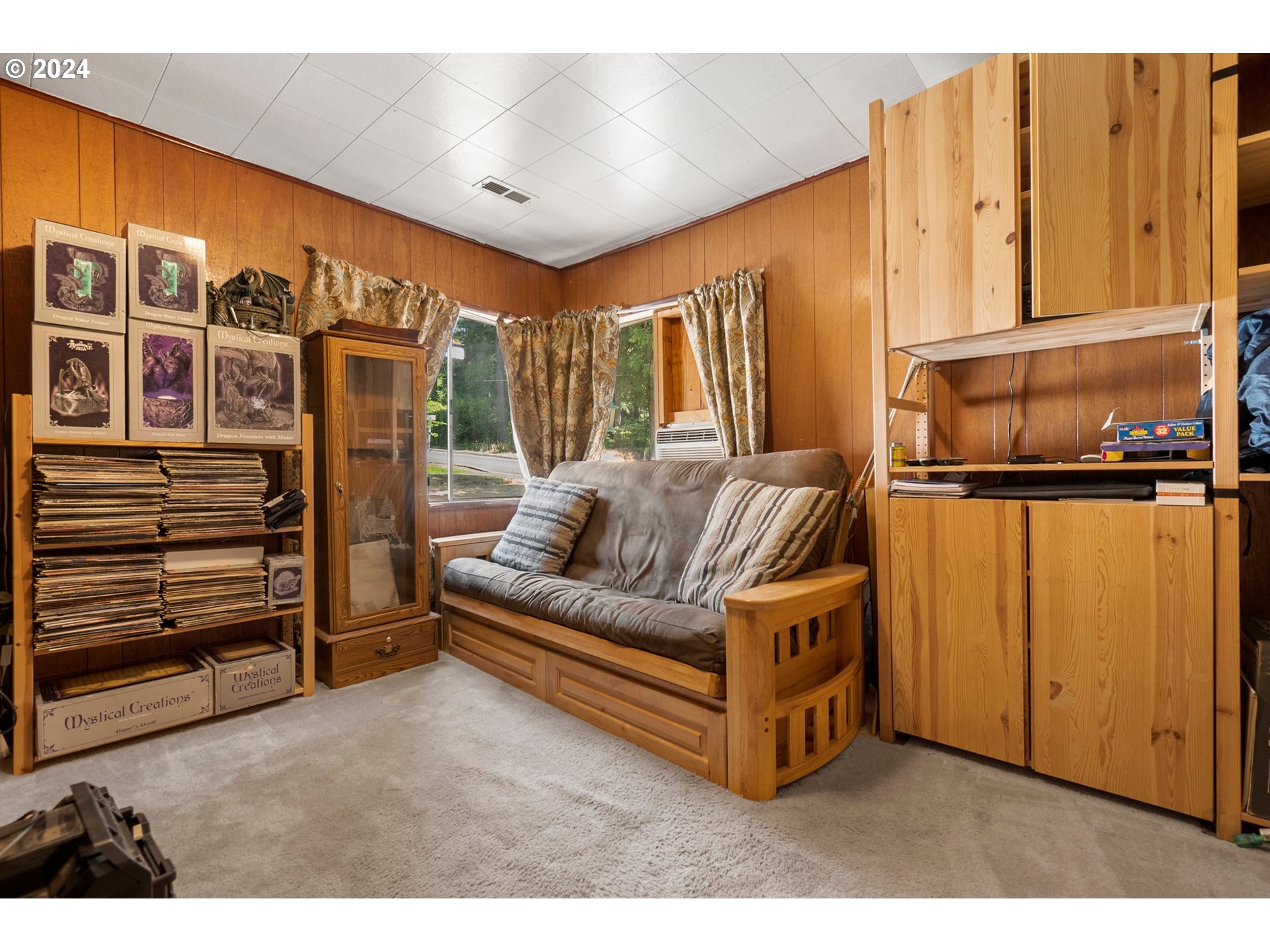 475 Frank Johns Road Stevenson, WA 98648 - Photo 13 of 17 a living room with a couch and dresser