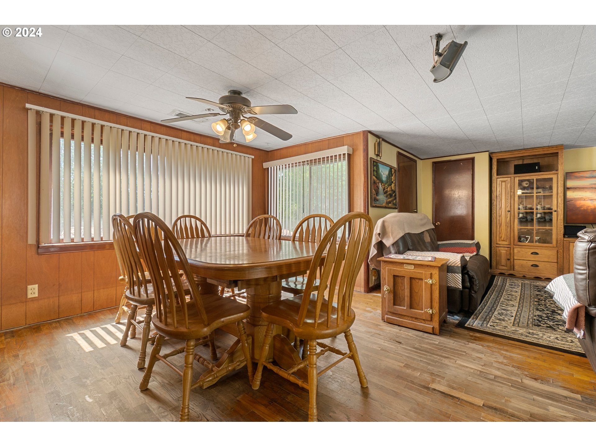 475 Frank Johns Road Stevenson, WA 98648 - Photo 9 of 17 a view of a dining room with furniture and wooden floor