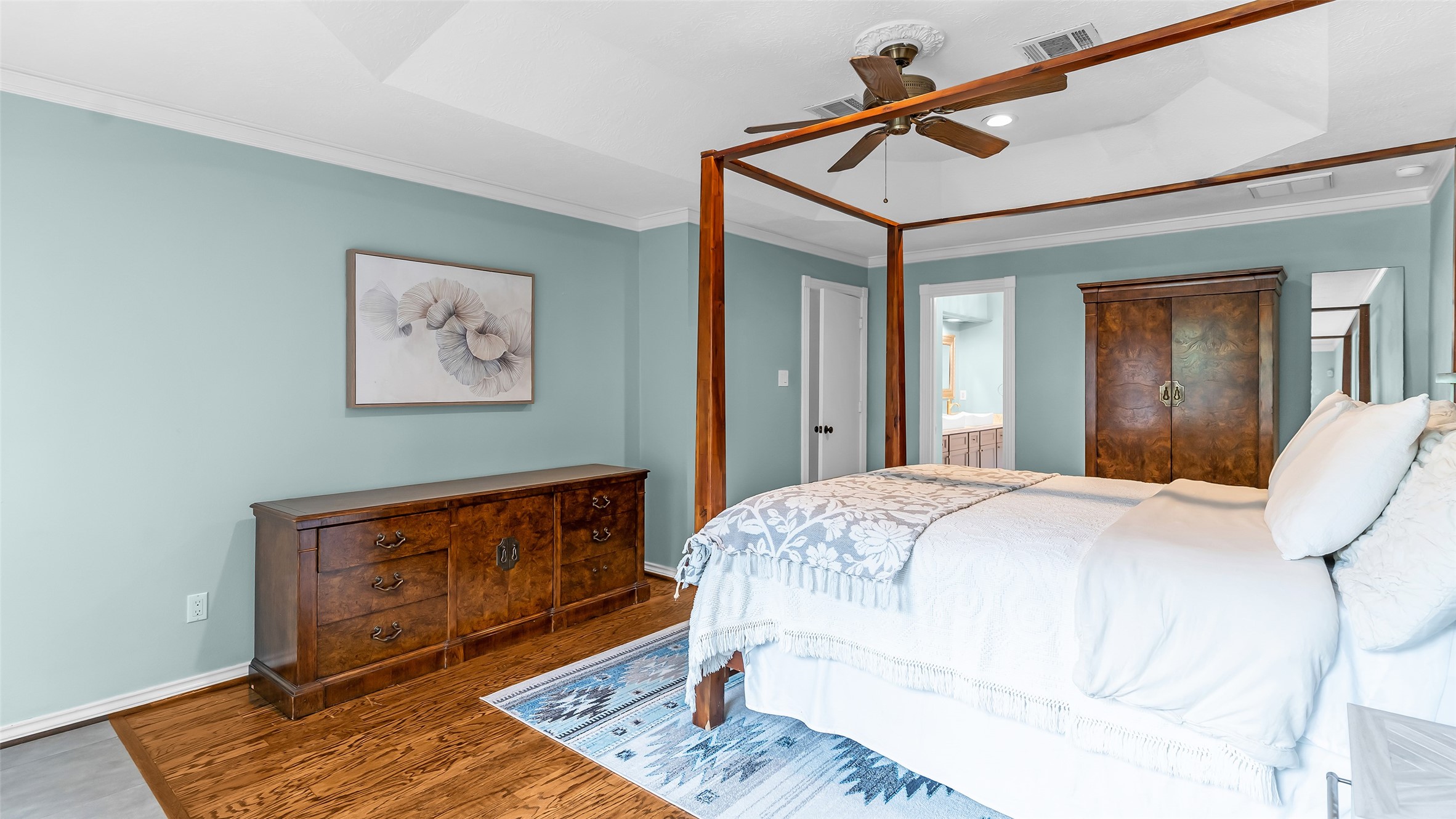 2607 Laurel Ridge Drive Houston, TX 77345 - Photo 21 of 47 a bedroom with a bed dresser and a window
