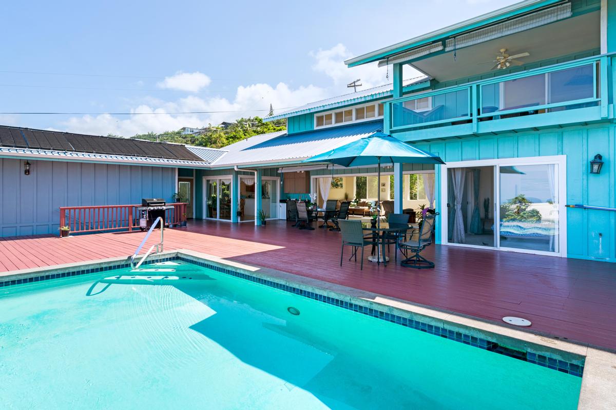 87-404 Kaohe Road Captain Cook, HI 96704 - Photo 1 of 25 a view of outdoor space yard deck patio and fire pit