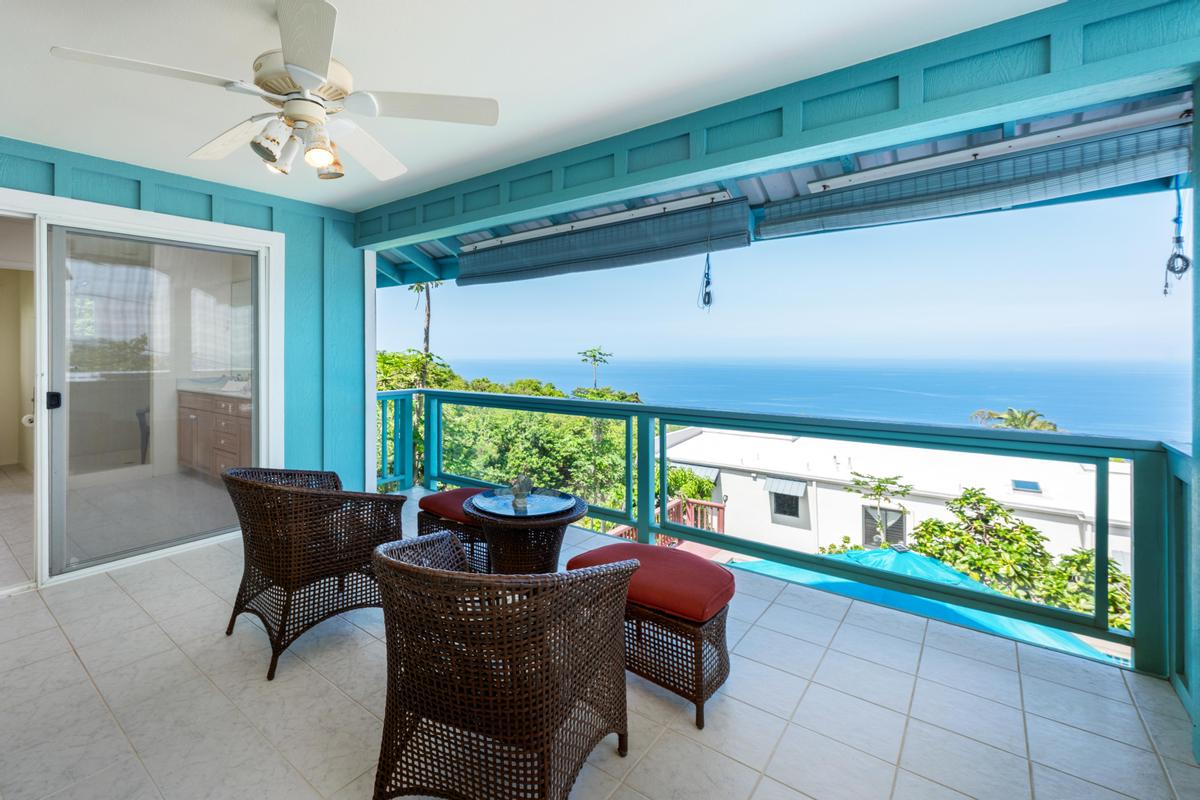 87-404 Kaohe Road Captain Cook, HI 96704 - Photo 14 of 25 a living room with furniture and a large window