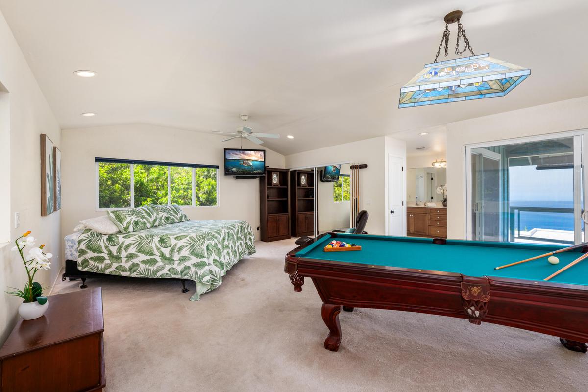 87-404 Kaohe Road Captain Cook, HI 96704 - Photo 17 of 25 a room with pool table and windows