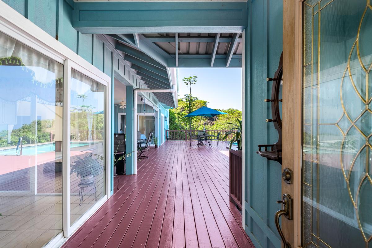 87-404 Kaohe Road Captain Cook, HI 96704 - Photo 8 of 25 a view of a house with a porch