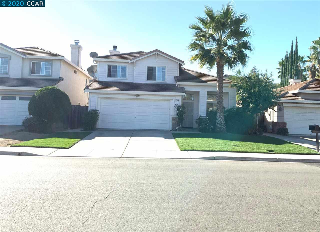 1316 Rockspring Way Antioch, CA 94531 - Photo 1 of 1 a house with a yard and a large trees