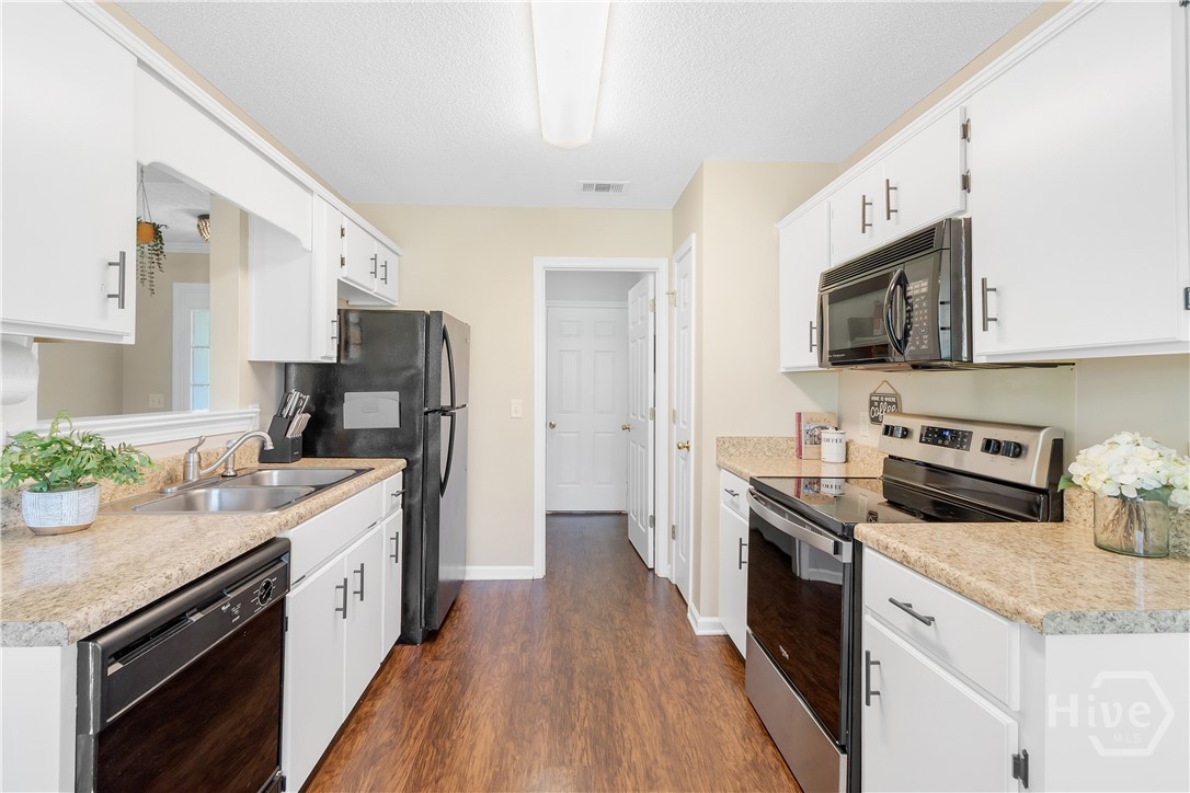 412 Greenway Street Pooler, GA 31322 - Photo 7 of 20 Kitchen connected to laundry room