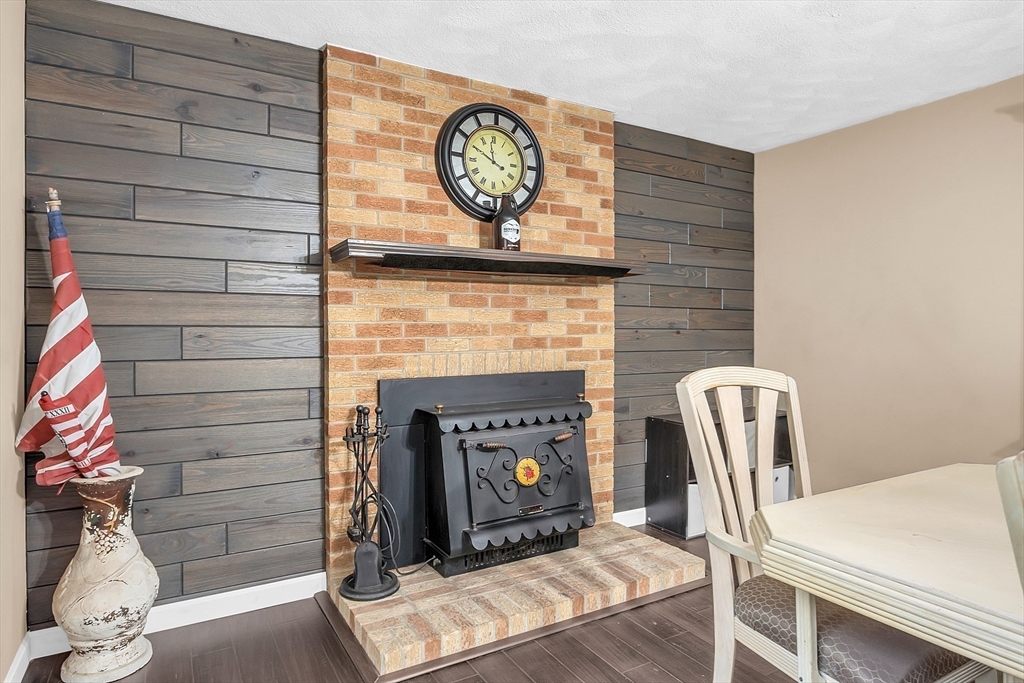 91 Chapin Road Hudson, MA 01749 - Photo 19 of 42 a living room with furniture and a fireplace