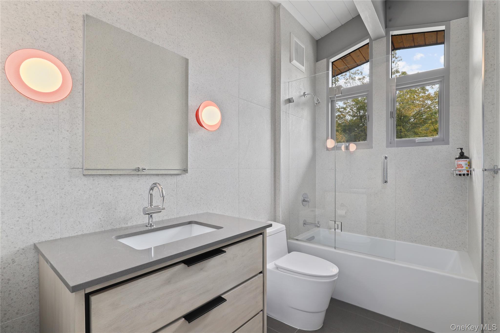 21 Black Spring Road Pound Ridge, NY 10576 - Photo 17 of 26 Upper level full bathroom with terrazzo tile