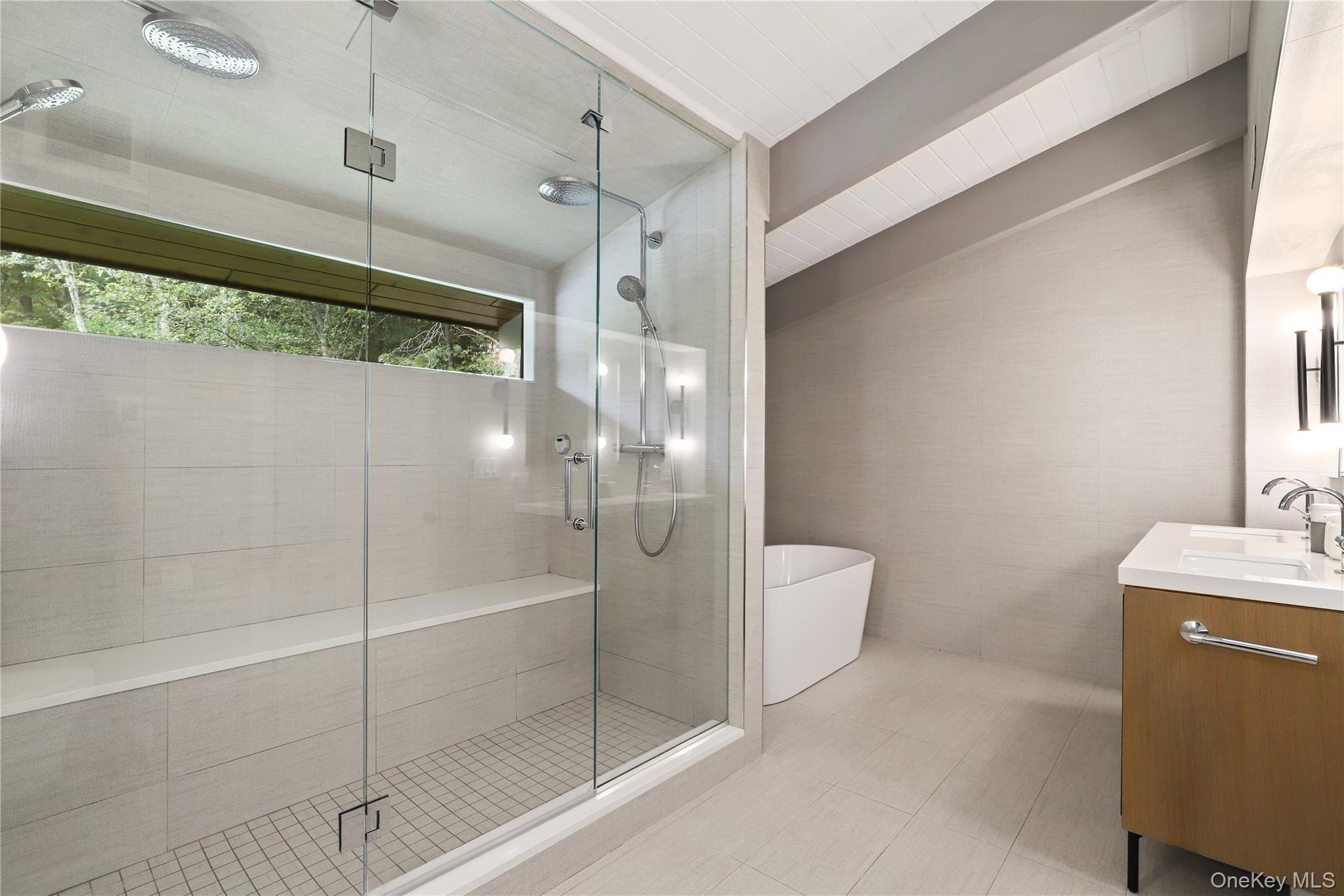 21 Black Spring Road Pound Ridge, NY 10576 - Photo 9 of 26 Spacious primary bathroom with imported Italian porcelain tile, double shower, double sink, large bath and heated floors