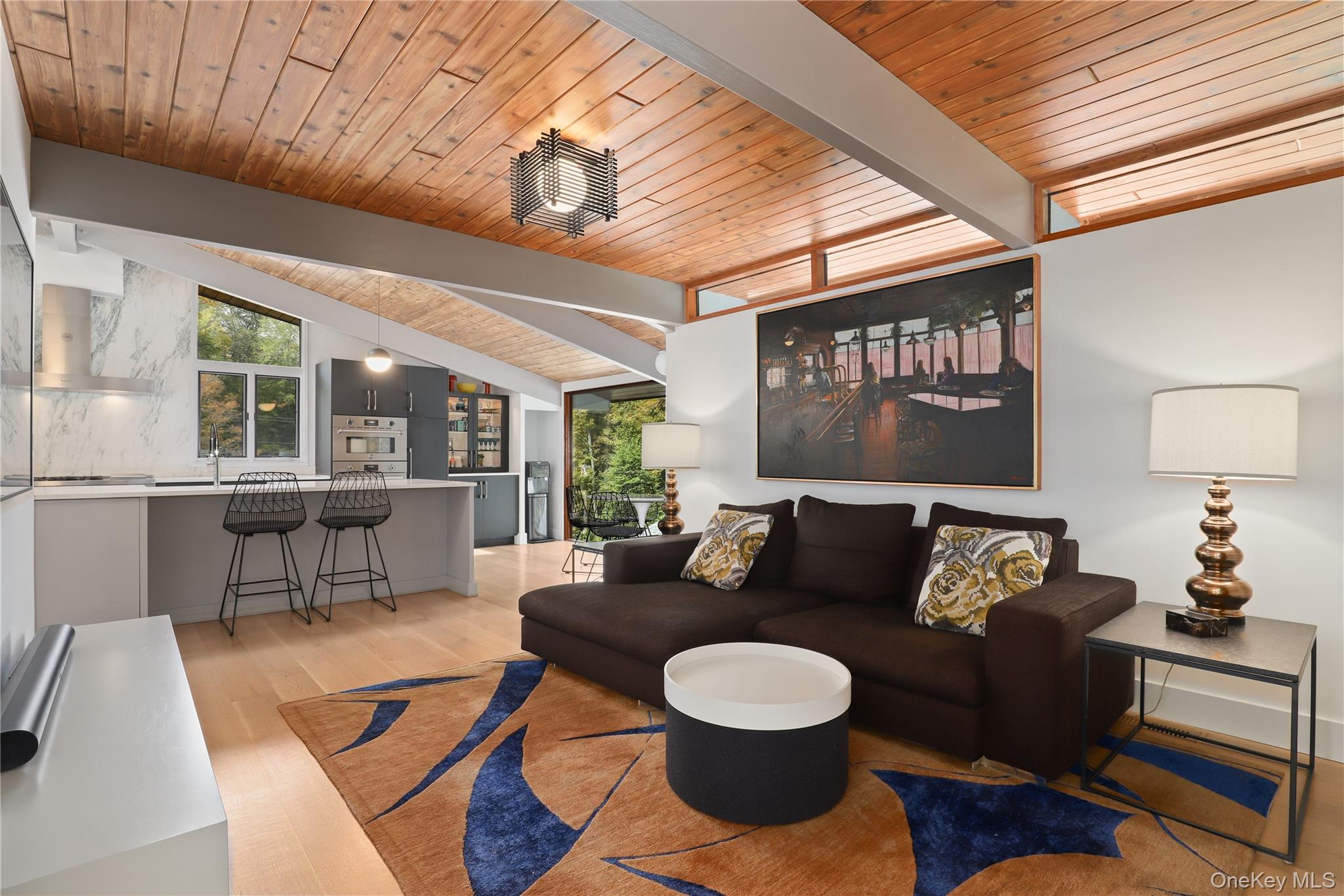 21 Black Spring Road Pound Ridge, NY 10576 - Photo 10 of 36 Comfortable den with easy access to kitchen and living room