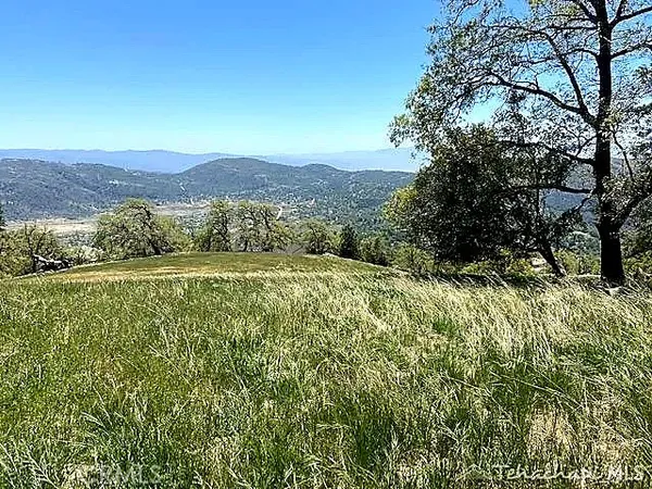 a view of an outdoor space with a lake view