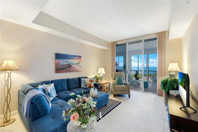 a bathroom with a shower sink vanity mirror and toilet