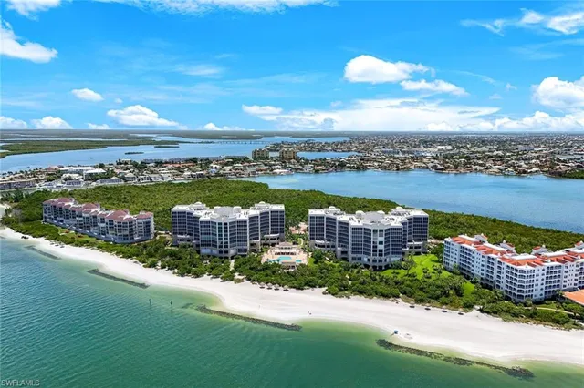 a view of a city with an ocean