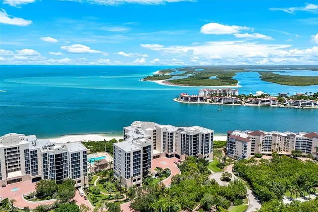 a lobby with furniture and potted plant