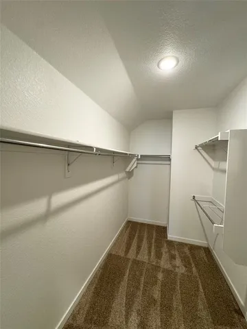 a view of a room with an empty space