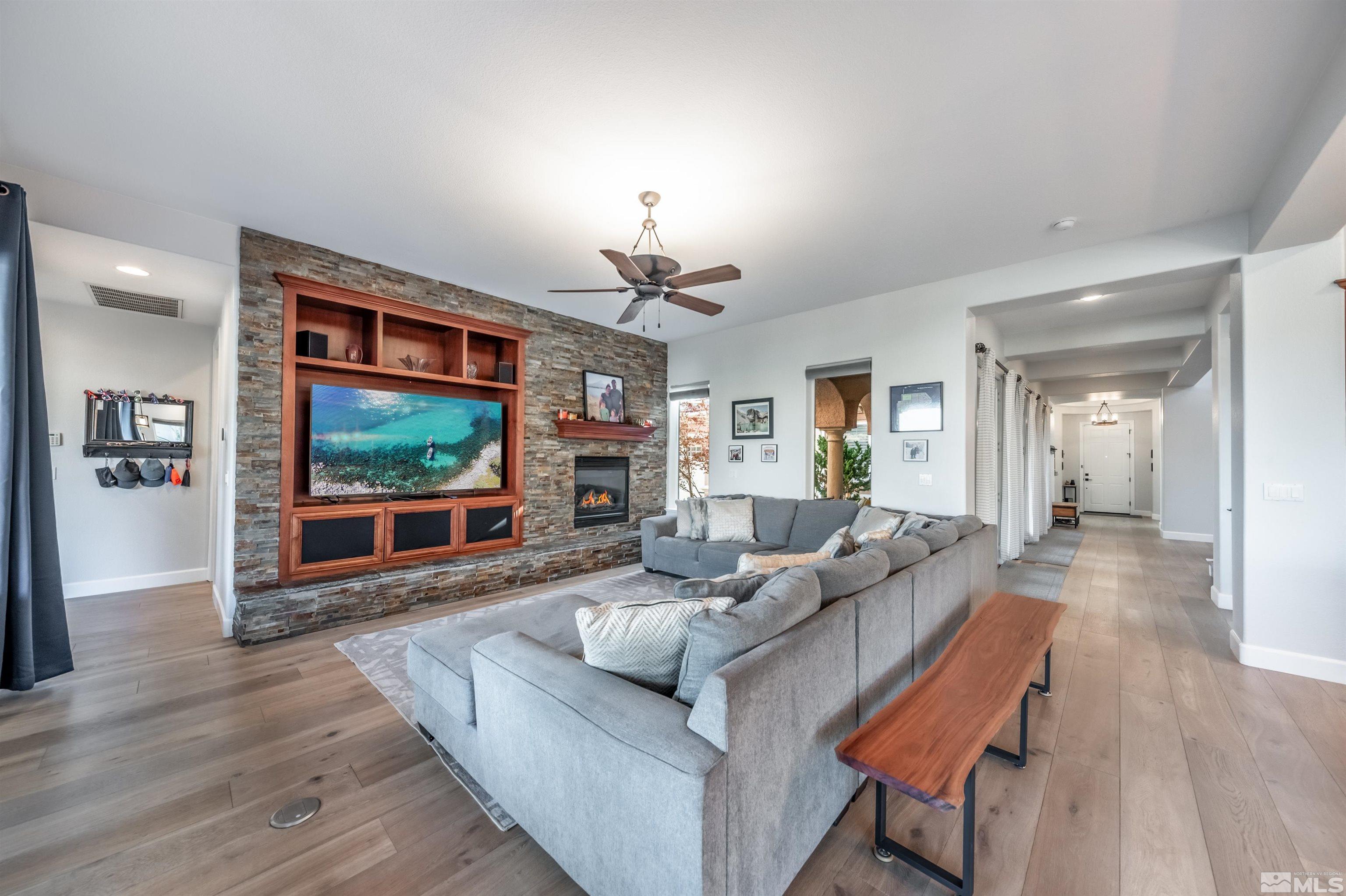 1880 Laurel Ridge Drive Reno, NV 89523 - Photo 13 of 40 a living room with furniture and a flat screen tv