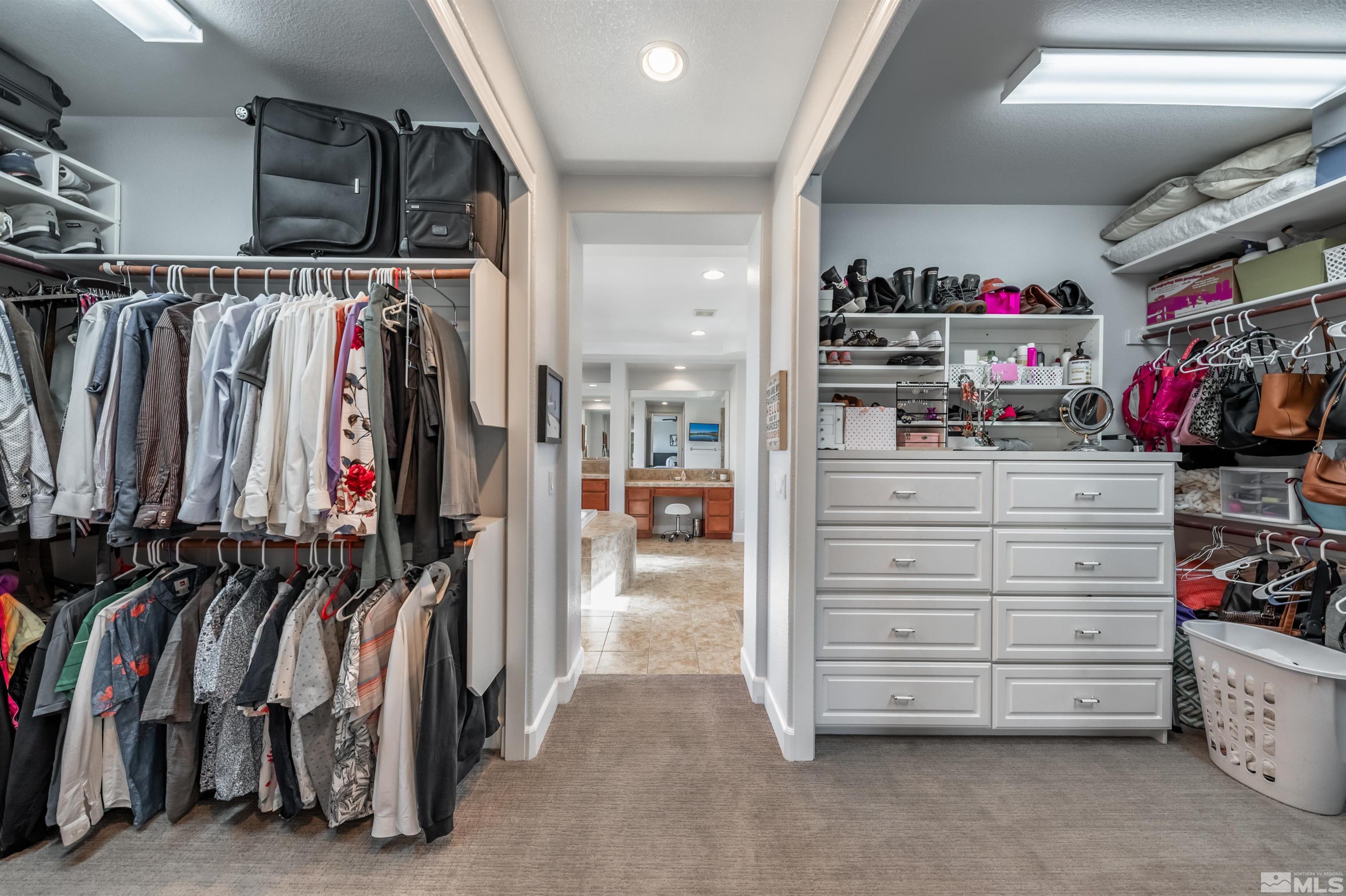 1880 Laurel Ridge Drive Reno, NV 89523 - Photo 20 of 40 a view of walk in closet with clothes and shoes
