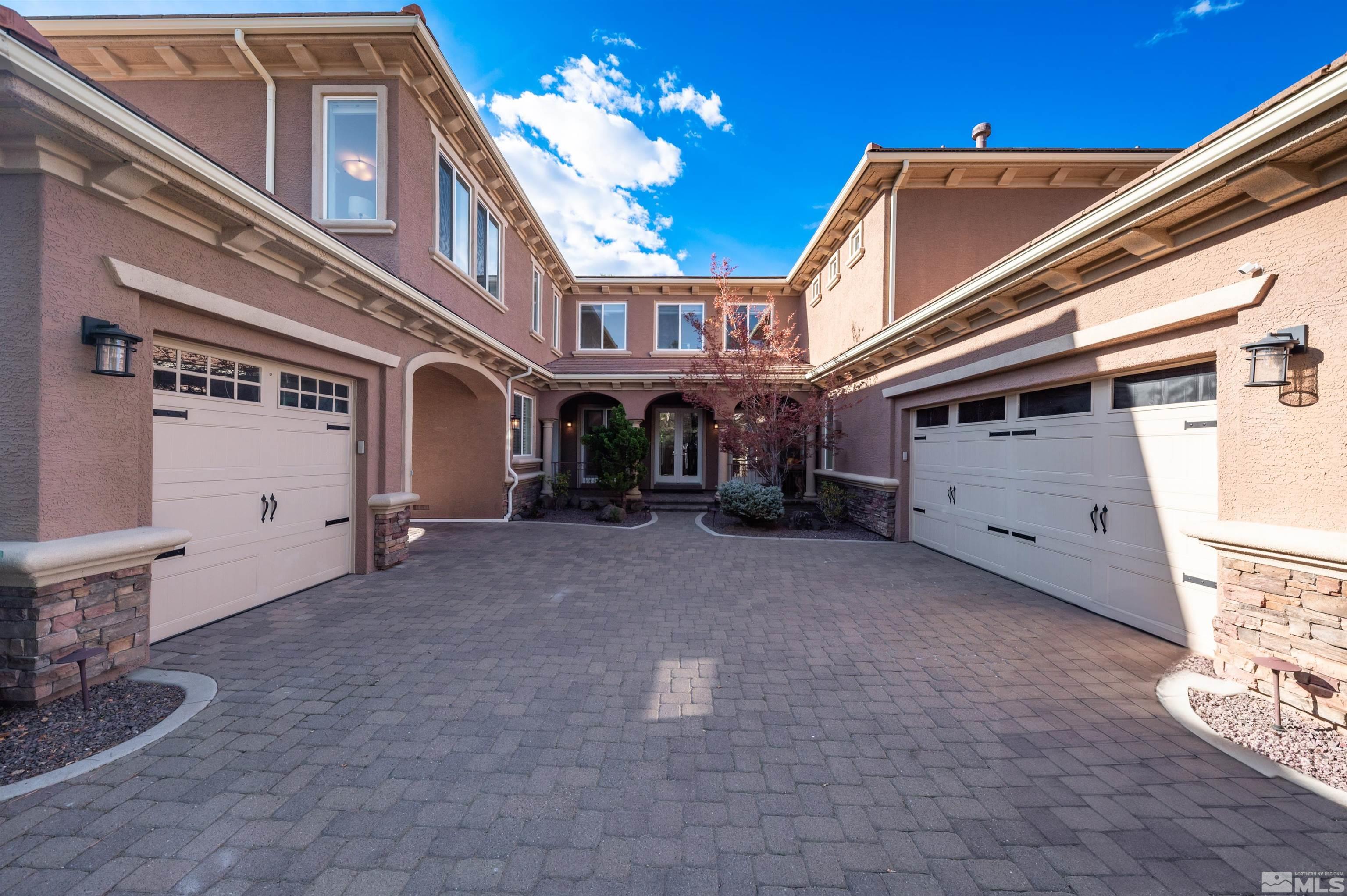 1880 Laurel Ridge Drive Reno, NV 89523 - Photo 2 of 40 a view of a house with a yard