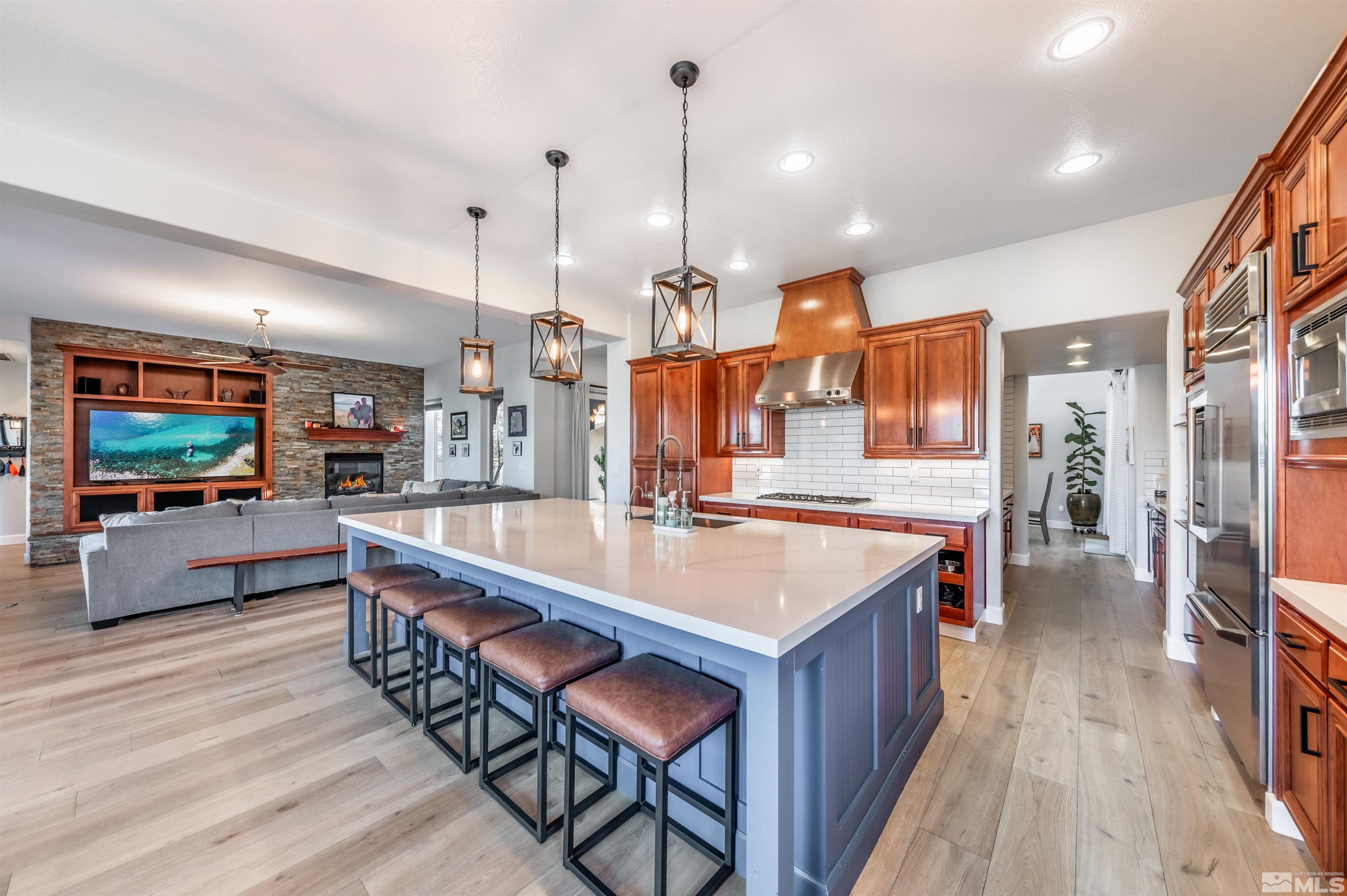 1880 Laurel Ridge Drive Reno, NV 89523 - Photo 10 of 40 a large kitchen with kitchen island a island in it