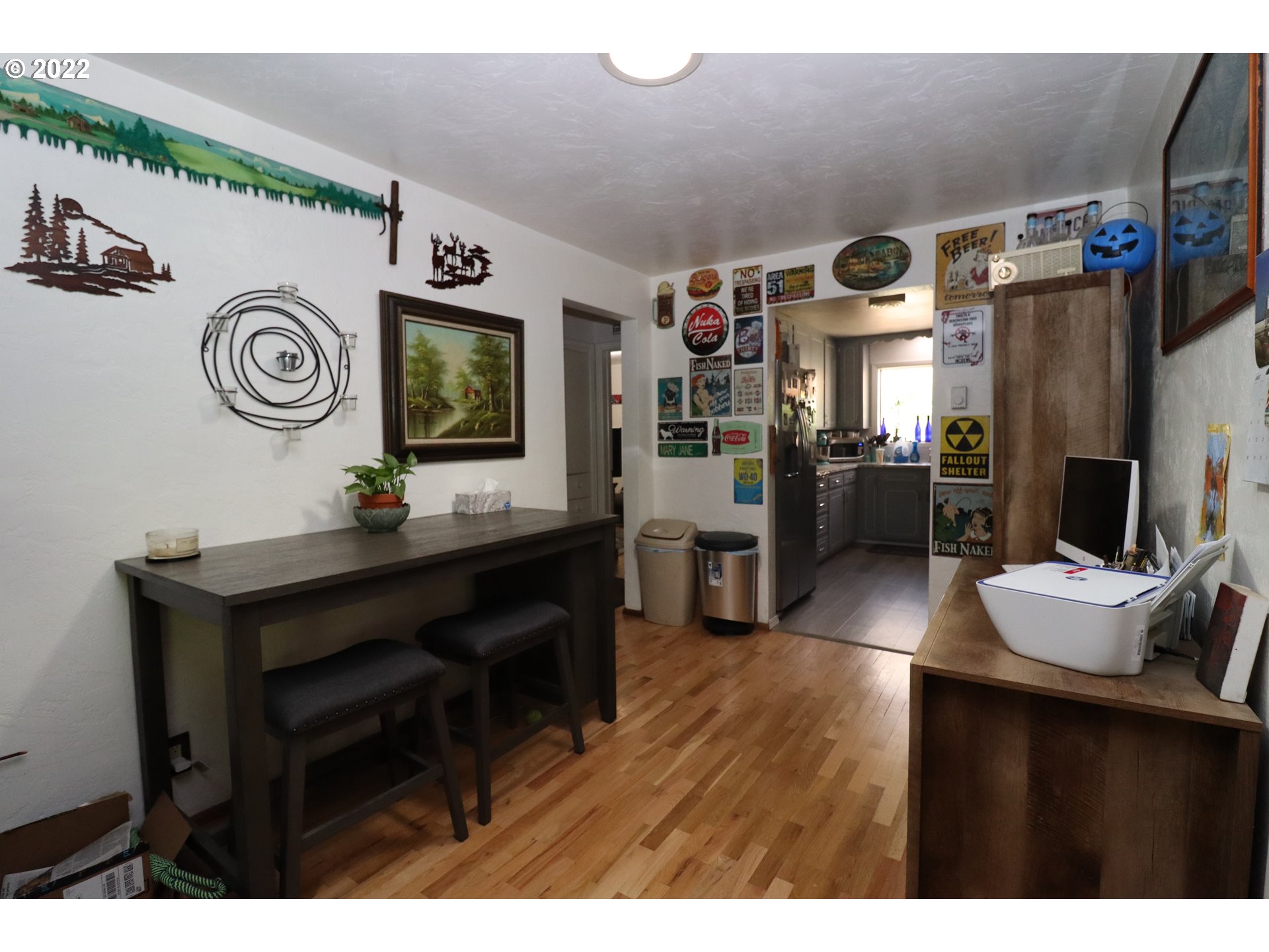 866 58th Street Springfield, OR 97478 - Photo 5 of 12 a living room with furniture and a flat screen tv
