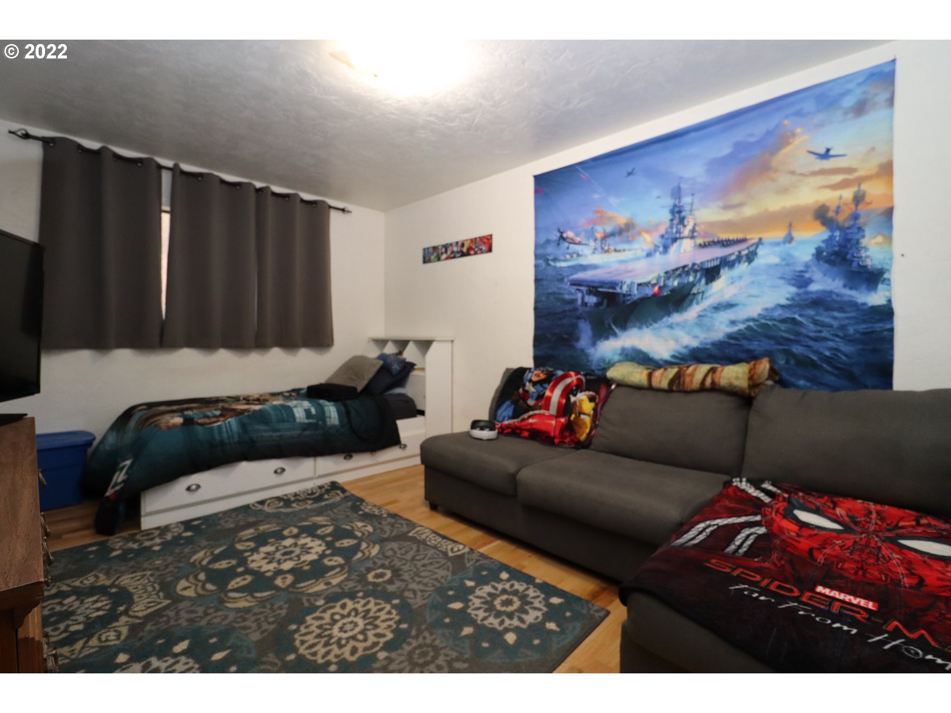 866 58th Street Springfield, OR 97478 - Photo 9 of 12 a living room with furniture and a painting on the wall