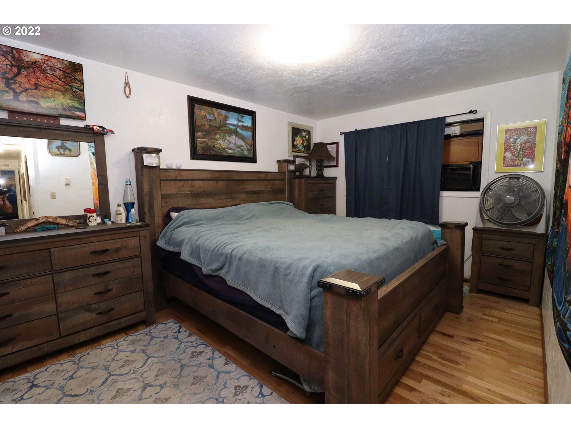 866 58th Street Springfield, OR 97478 - Photo 10 of 12 a bedroom with a bed and dresser