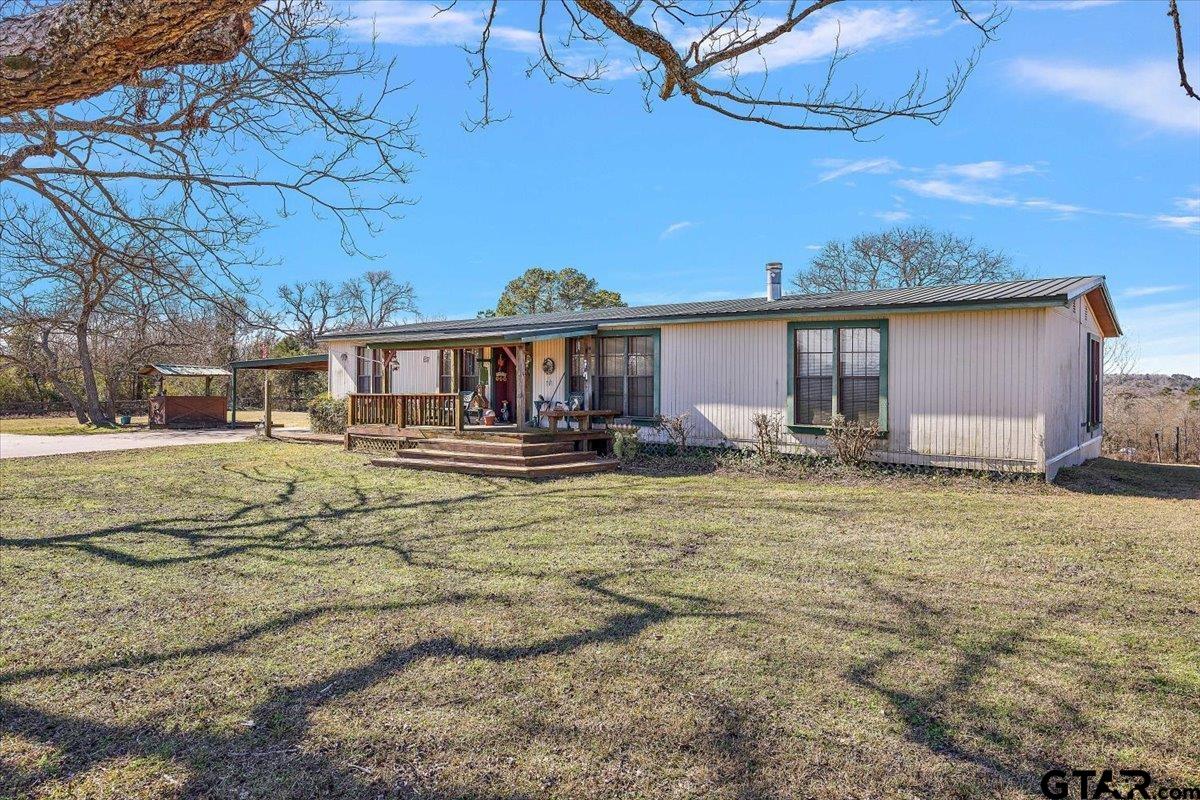 304 County Road 2206 Rusk, TX 75785 - Photo 20 of 27 a front view of a house with swimming pool